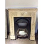 Three Victorian cast iron bedroom fire surrounds, or various designs, measuring 96cm x 79cm, 96cm