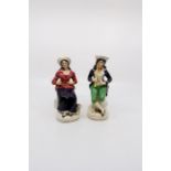 A pair of mid 19th Century Staffordshire figures
