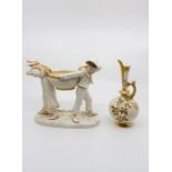 A Royal Worcester figure of a boy and girl carrying a basket over their shoulders wearing coastal