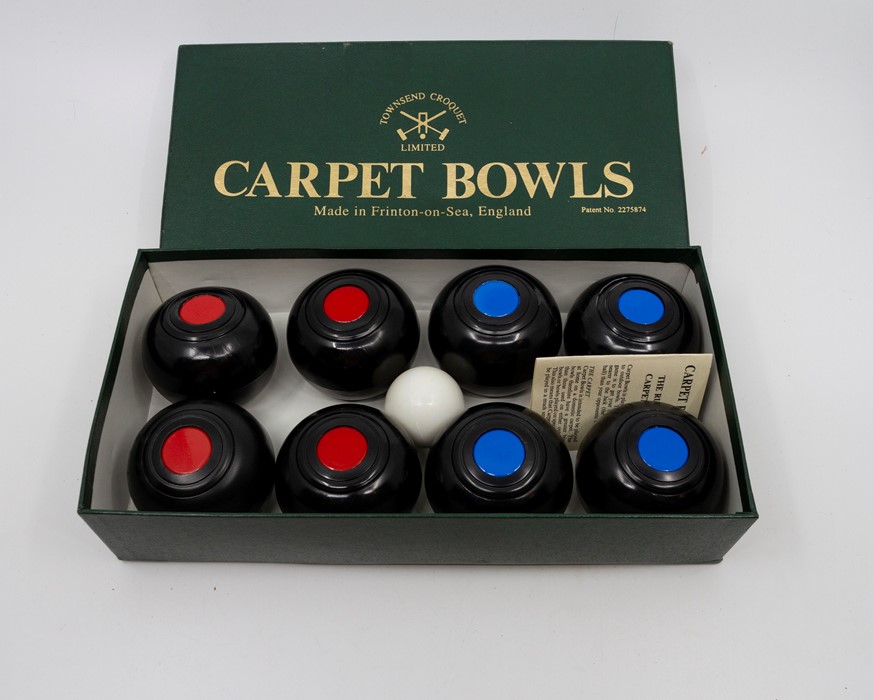 Boxed carpet bowls and a Parker Bros Duck Shooting game.