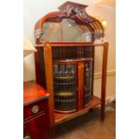 An Edwardian Arts and Crafts mahogany display cabinet, circa 1905, in the manner of Shapland and