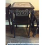 A 19th Century Chinese two-tier square occasional table, red inset marble top, carved frame,