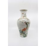 A finely enamelled Chinese famille rose vase, seal mark of Qianlong, of upright baluster form
