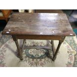 A Victorian Gothic Revival oak side table, circa 1870, standing on turned legs, 69cm high, 81cm