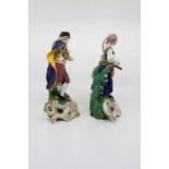 A pair of Samson of Paris porcelain figures as musicians standing on gilt scrolled bases. Date c.