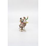 A Continental figure of a dancing couple. Circa late 19th century. Size 18cm. high.  Condition;