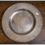17thC Pewter. An 18¼ inch approx broad rimmed pewter charger by Nicholas Kelk of London, circa 1670,