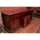 A Victorian style mahogany twin pedestal sideboard, of inverted breakfront form, fitted with three