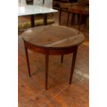 A George III mahogany and strung fold-over D-end tea table, circa 1800, gateleg action, tapered