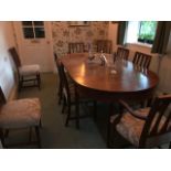 A George III mahogany extending dining table, circa 1800, fitted with three removable leaves (one