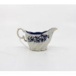 A Liverpool Penningtons blue and white printed 'Low Chelsea Ewer' decorated sauce boat decorated