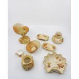 Royal Worcester blush ivory items to include Nautilus shell vase, basket, dishes etc [8]