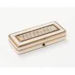 A 19th Century ivory patch box, of rectangular form, the hinged lid set with a plaited lock of hair,