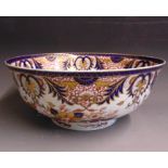 A large Derby punch bowl, decorated in the imari palette, circa 1820-25, standard red mark, 36.6cm