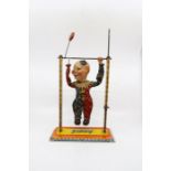 An Arnold, West Germany tinplate "Jimmy" acrobatic clown, head loose a/f