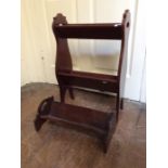 An early 20th Century mahogany bookstand, 68cm high, together with a further small bookstand (2)