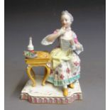 A Meissen figure, ‘Sense of Taste’, one of the set of five senses, mid 19th Century, blue crossed