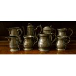 various large pewter tankards and containers, including 2 quart jugs with touch marks (8)