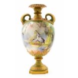 A Hadley's Worcester twin handled baluster vase, circa 1900, dolphin twin handles, the body