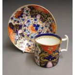 A Derby coffee can and saucer, painted in the imari style, circa 1820-25, red mark, can 7cm