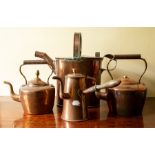 Copper items including 2 x kettles, a chocolate pot and a watering can. (4)