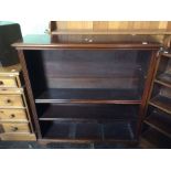A mid 20th Century mahogany open bookcase, fitted with three adjustable shelves, 106cm high, 102cm