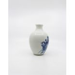 An early 20th century Chinese Republic period blue and white vase depicting a Damo type character