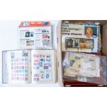 A quantity of stamp albums and loose including a Meteor stamp album/