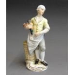 A Meissen ‘Cris de Paris’ figure of a poultry chef, standing on a gilt scroll work base, mid 19th