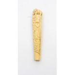 An antique Oriental ivory walking cane handle, late 19th or early 20th Century, carved in high