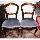 A pair of 19th Century French Boulle work side chairs, inlaid with brass decoration (2)