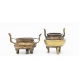 A pair of Chinese brass miniature cauldrons