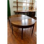 A George III mahogany D-end gateleg dining table, circa 1800, tapered block legs, width 127cm