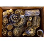A box of blue and white ceramics to included strainers, teawares, plates, mustard pots with covers