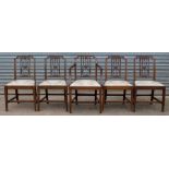 A set of six George III mahogany dining chairs, circa 1800, in the manner of Thomas Sheraton,