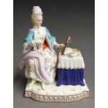 A Meissen figure of Sight, one of the five senses, the young lady sitting at her dressing table