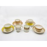 A collection of 18th century Derby porcelain including four cups and saucers in yellow and pink gilt