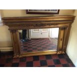 A French giltwood over-mantle mirror, moulded cornice top
