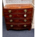 A George III mahogany bow fronted chest of drawers, circa 1800, fitted with four long graduated