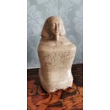 An Egyptian Block Statue. Carved in local Egyptian stone, block statues related to every day people,