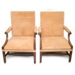 A pair of George III style mahogany open armchairs, in the manner of Thomas Chippendale, with