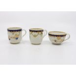 Three Worcester fluted cups - comprising of two coffee cups and one tea cup, painted with blue and