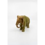 A Royal Dux figure of an bull Elephant, no stamp, dust gilded over green, 15 cm high approx, one