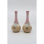 A pair of Ault of Swadlincote baluster vases printed with Pierrots. Size 24cm. high. Condition; Some