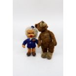 A vintage Teddy Bear in worn condition and a felt doll with Derby Airways pin badge.