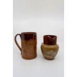A collection of stoneware jugs, tankards and cups, mostly Doulton Lambether salt glazed, to