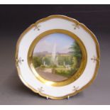 A KPM Berlin cabinet plate, painted with a view of Schloss Sanssouci within a deep gilt border,