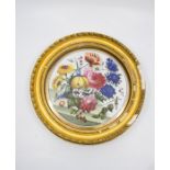 A pair of 19th century painted porcelain plaques with floral and fruit still life images