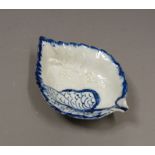 A Liverpool blue and white leaf shaped pickle dish with moulded and painted leaves and flowers,