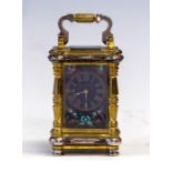 A late 19th Century French miniature carriage clock, brass and silvered corniche case with enamelled